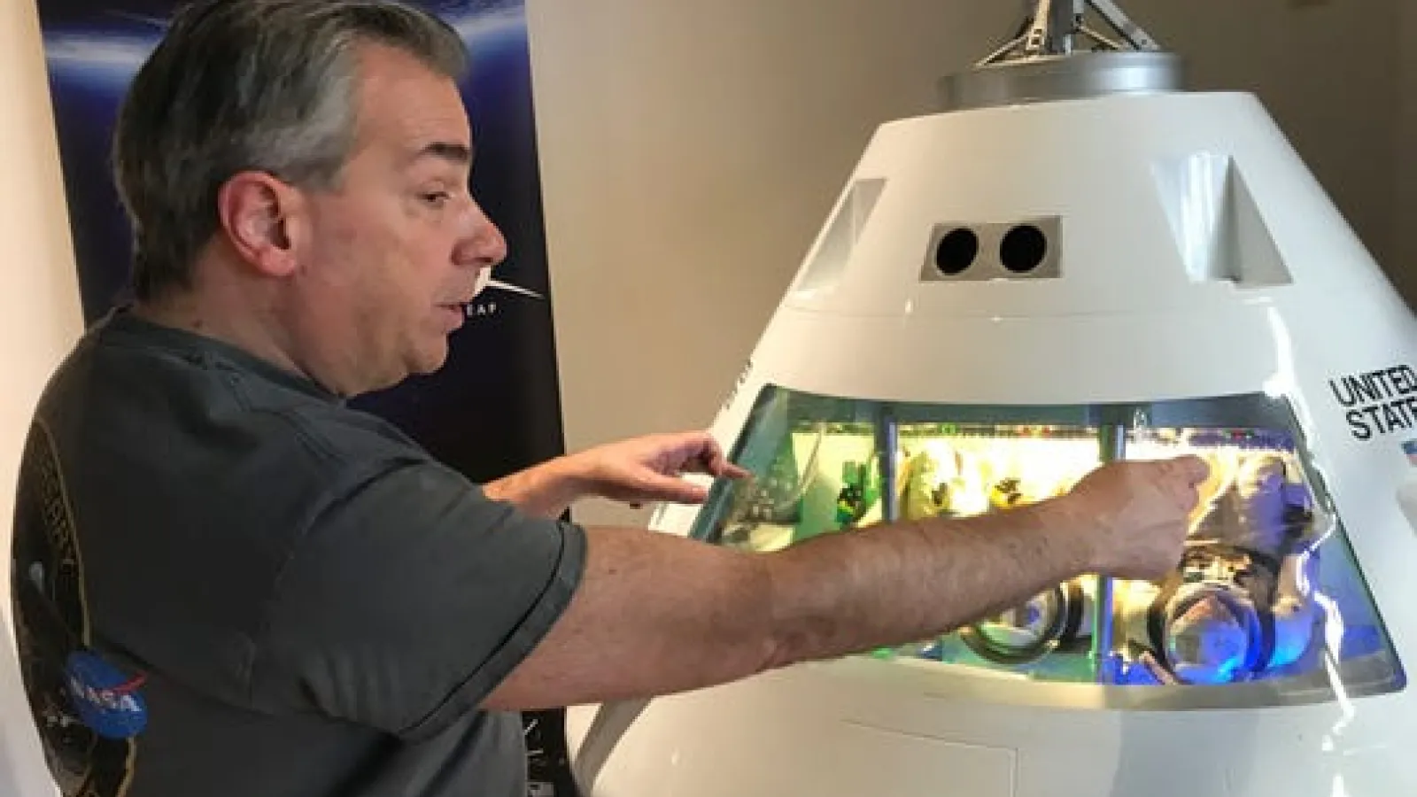 David DeFelice, Community Relations Outreach director for NASA's Glenn Research Center, talks about how three astronauts were wedged into Apollo capsules during space missions. The Apollo exhibit opened Saturday at The Works.