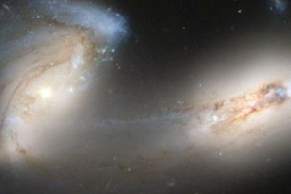 Two galaxies in the midst of colliding.